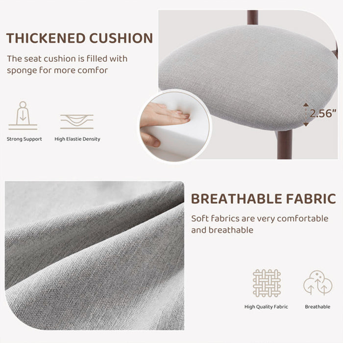 Gray cushion with text on thickening and breathability, close-up of fabric texture.