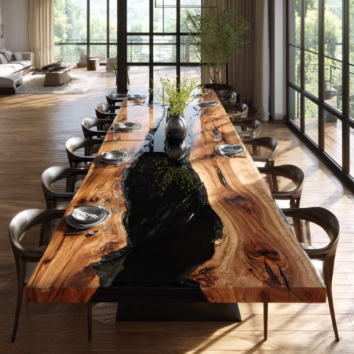 Long wooden dining table with a black resin feature in a modern room with large windows.