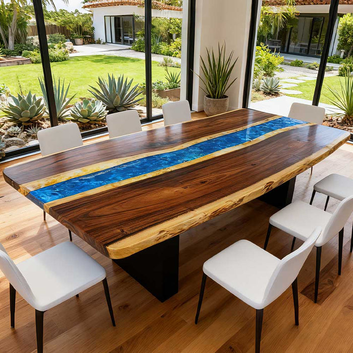 Wooden dining table with blue river design in a modern indoor setting
