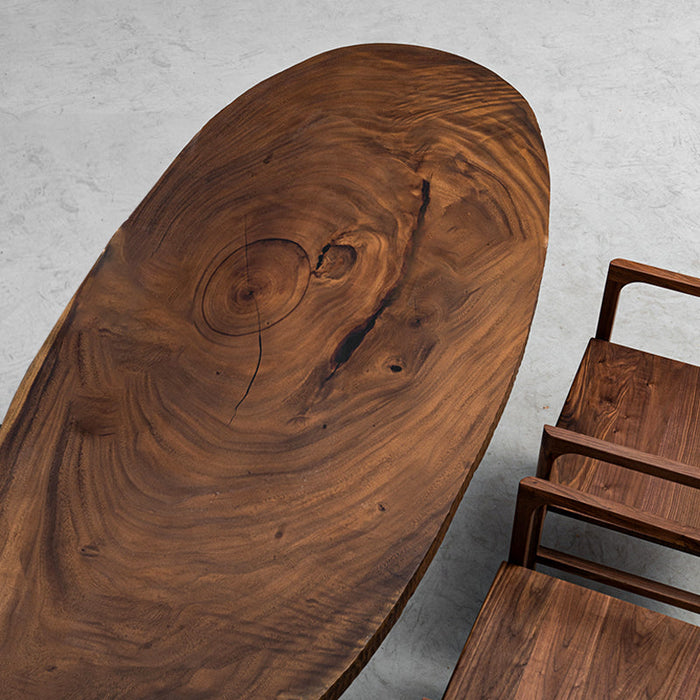 Live edge elliptical table made from premium walnut wood natural slabs.