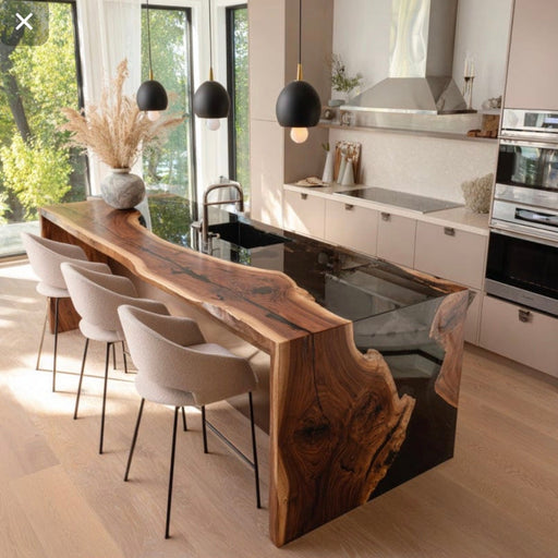 Modern kitchen with a long wooden dining table and chairs.