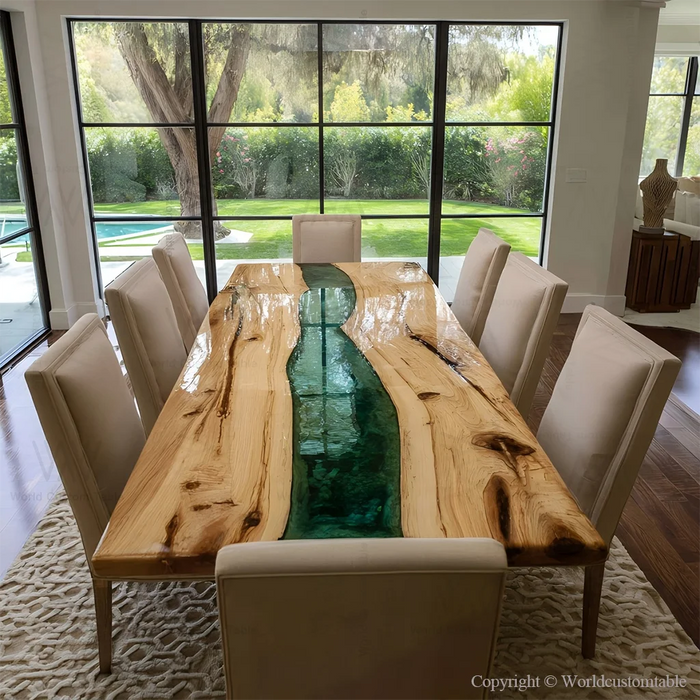 White poplar dining table with emerald green epoxy top showcasing natural wood grain