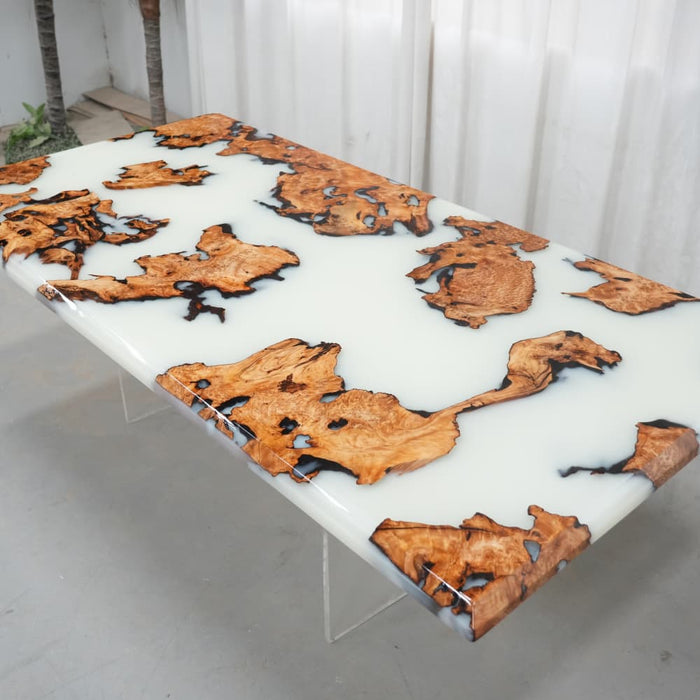 White resin burl wood dining room table with unique natural patterns